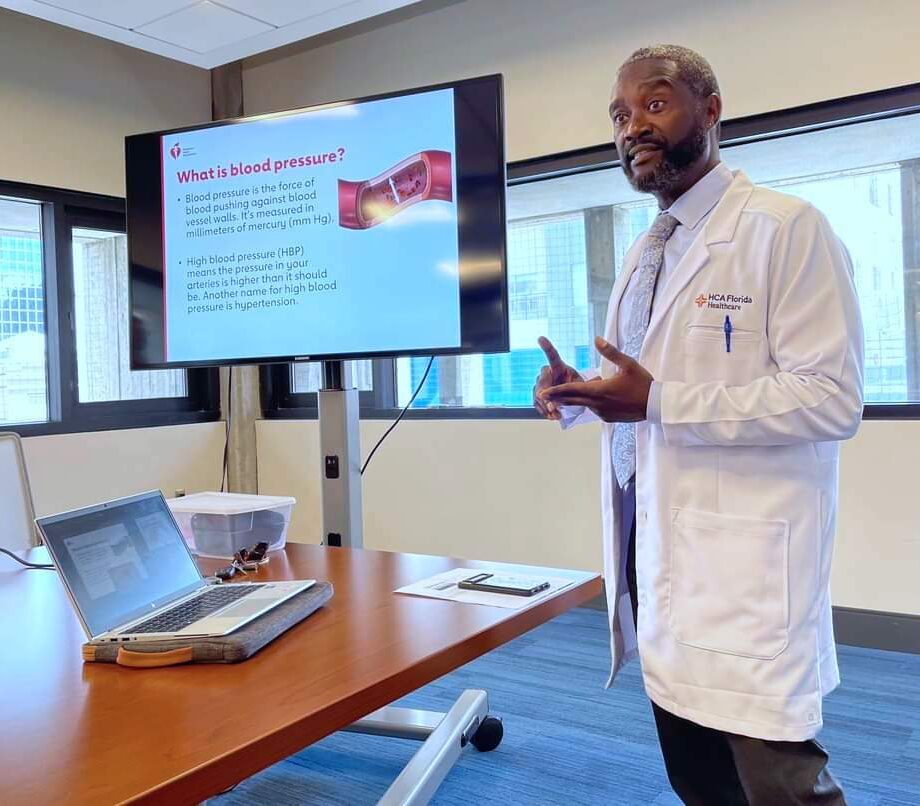 Dr. Duron Lee doing a blood pressure presentation